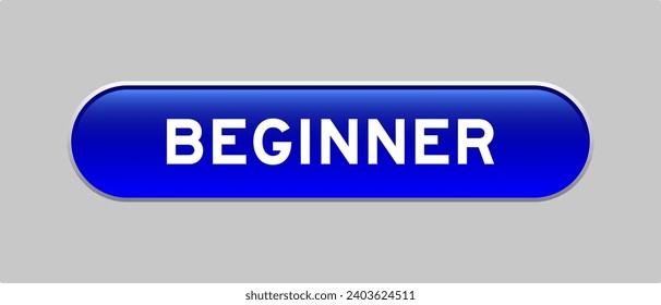 Blue color capsule shape button with word beginner on gray background
