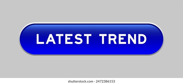 Blue color capsule shape button with word latest trend on gray background