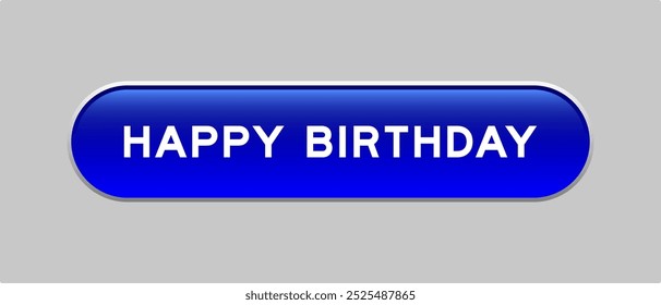 Botón azul de la forma de la cápsula del color con el cumpleaños feliz de la palabra en fondo gris
