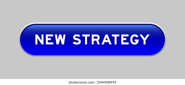 Blue color capsule shape button with word new strategy on gray background