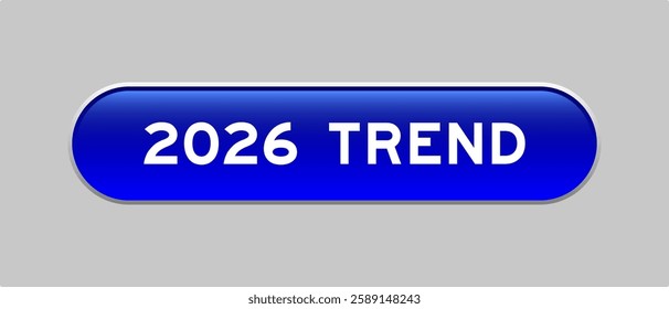 Blue color capsule shape button with word 2026 trend on gray background