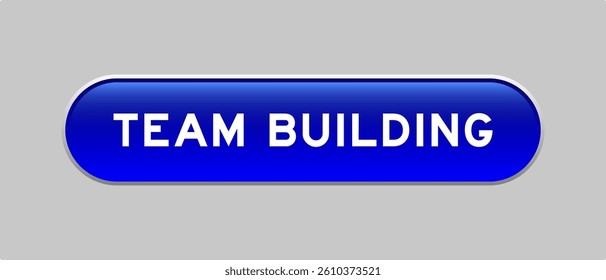 Blue color capsule shape button with word team building on gray background