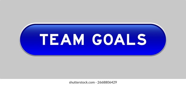 Blue color capsule shape button with word team goals on gray background
