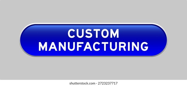 Botón de la forma de la cápsula del color azul con la fabricación de encargo de la palabra en fondo gris
