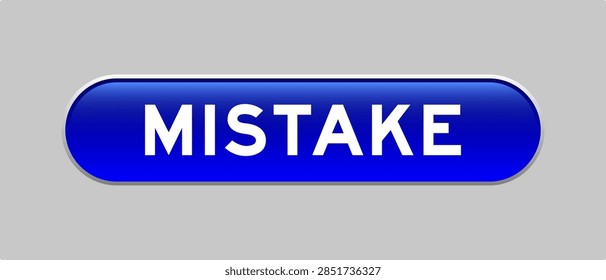 Blue color capsule shape button with word mistake on gray background