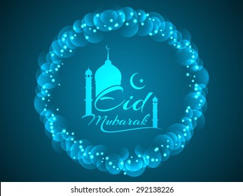 Blue color glittering Eid Mubarak greeting card design.