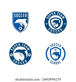 Un logotipo de fútbol de color azul con un delfín encerrado dentro de un escudo y emblema circular. Este diseño ofrece un emblema dinámico, perfecto para equipos de fútbol o clubes.