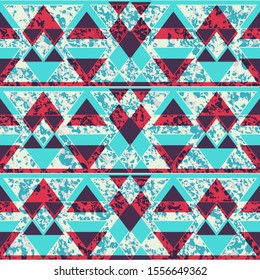 Blue color triangle pattern with grunge effect.