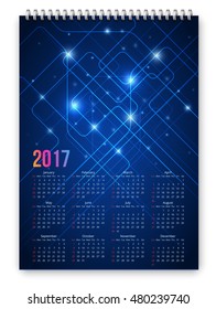 Blue colored futuristic abstract design calendar 2017 template. Week starts from sunday. Vector realistic spiral notepad notebook