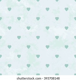 Blue colored seamless pattern of hearts. Minimalistic vintage simple seamless background. Old paper texture. Vector illustration