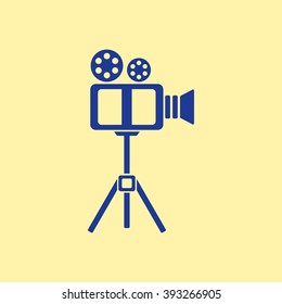Blue Colored Video Camera Icon on Light Orange Background. Eps-10.