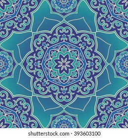 Blue colorful ornament of mandala on a light blue background. Template for oriental carpets, shawls, textiles, fabric, wallpaper, wrapping paper.