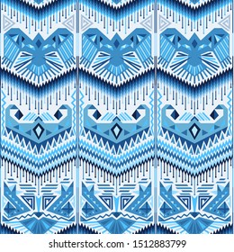 Blue colors ikat seamless background with stylized birds and chevrons. Ornate ethnic ornament with different tribal style shapes. Abstract bohemian repeatable pattern. Vector illustration.