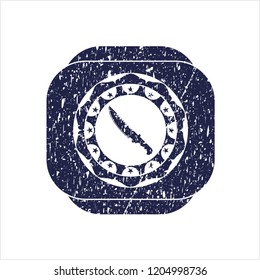 Blue combat knife icon inside distress rubber grunge seal