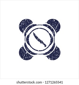 Blue combat knife icon inside distress rubber seal