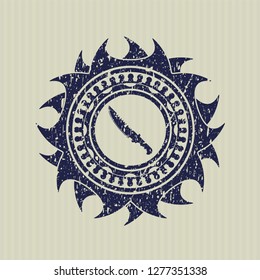 Blue combat knife icon inside grunge style stamp