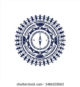  Blue compass icon inside distressed rubber grunge texture stamp