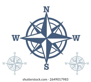 A blue compass rose illustration with the cardinal directions labeled and two smaller, lighter versions of the compass rose.