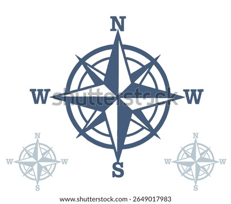 A blue compass rose illustration with the cardinal directions labeled and two smaller, lighter versions of the compass rose.