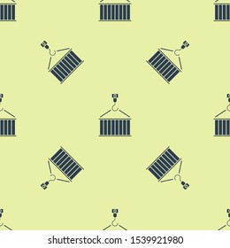 Blue Container on crane icon isolated seamless pattern on yellow background. Crane lifts a container with cargo.  Vector Illustration