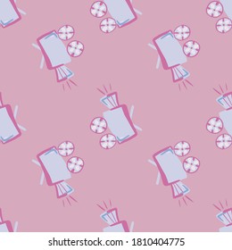 La cámara con contorno azul forma un patrón sin fisuras. Figuras simples del cine sobre fondo rosa suave. Fondo estilizado. Impresión decorativa para papel pintado, textil, envoltura, impresión de tela. Ilustración del vector