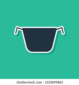 Blue Cooking pot icon isolated on green background. Boil or stew food symbol.  Vector Illustration