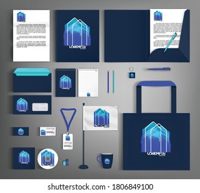 Blue corporate identity template with abstract house element. Business set stationery.