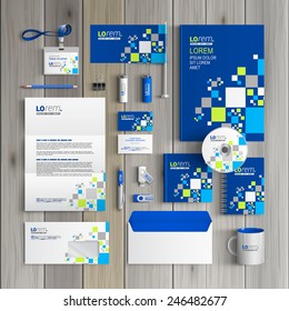 Blue corporate identity template design with pattern consists white and green squares. Business stationery