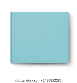 Blue covered notebook casting a shadow, positioned on a white surface