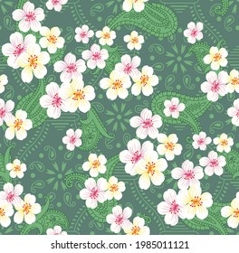 blue and cream vector flowers with paisley pattern on green background