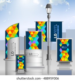 Blue creative outdoor advertising design for corporate identity with color triangles. Stationery set