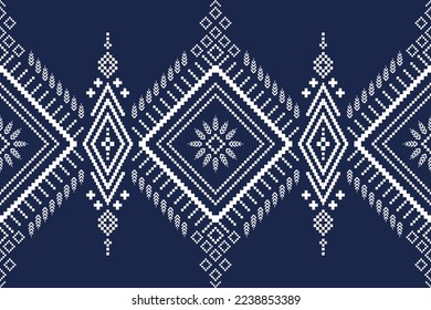 Blue cross stitch traditional ethnic pattern paisley flower Ikat background abstract Aztec African Indonesian Indian seamless pattern for fabric print cloth dress carpet curtains and sarong