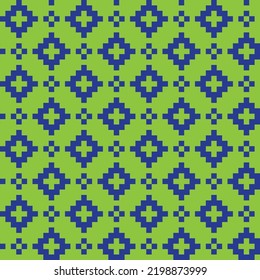 Trazo de punto cruzado azul sobre fondo verde. Los puntos cuadrados azules sobre el fondo verde. Diseño monocromo de telas de color para la venta. Tejiendo arte artesanal.