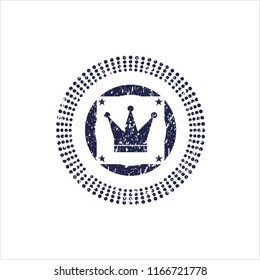 Blue crown icon inside rubber grunge stamp