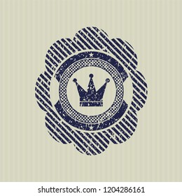 Blue crown icon inside rubber stamp