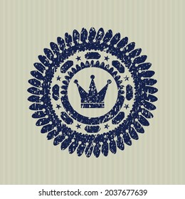 Icono de la corona azul dentro del sello de goma. 
