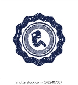 Blue crunch icon inside distressed rubber seal