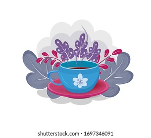 Té azul en un platillo rojo rodeado de follaje