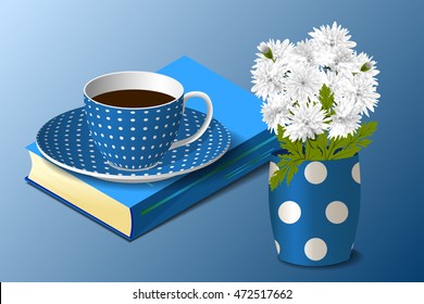 Blue cup, vase and book