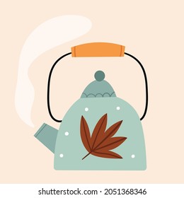 Blue cute teapot with autumn leaves. Scandinavian style.