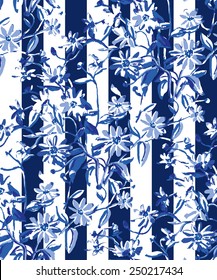 Blue daisy flowers on the dark blue striped background. Seamless pattern. 