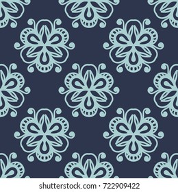 Blue decorative flowers on blue background