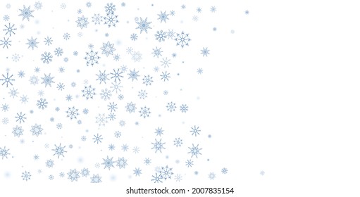 Blue delicate openwork snowflakes scatter on a white background. Festive background, postcard design, wallpaper
