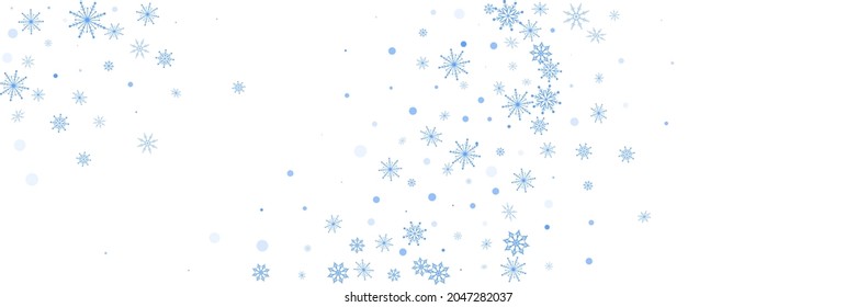 Blue delicate openwork snowflakes scatter on a white background. Festive background, postcard design, wallpaper
