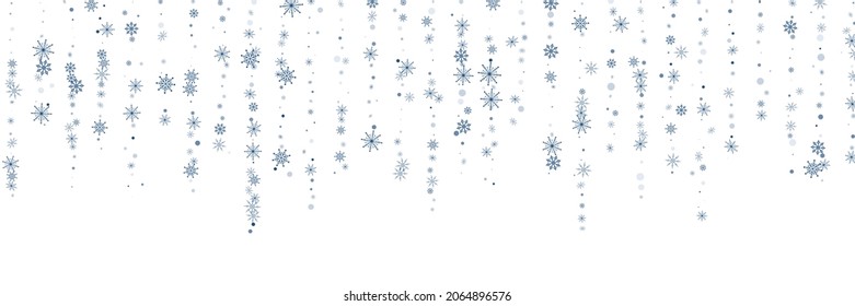 Blue delicate openwork snowflakes scatter on a white background. Festive background, postcard design, wallpaper