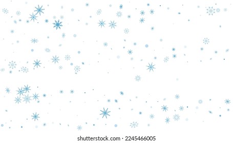 Blue delicate openwork snowflakes are scattered on a white background. Festive background, new year or christmas design