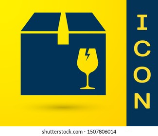 Blue Delivery package box with fragile content symbol of broken glass icon isolated on yellow background. Box, package, parcel sign.  Vector Illustration