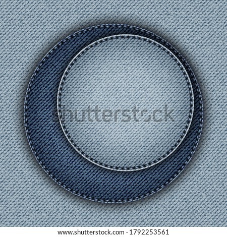 Blue denim design with two asymmetric circles with stitchers.