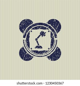 Blue desk lamp icon inside distress rubber seal with grunge texture