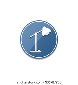 Blue desk lamp icon with shadow